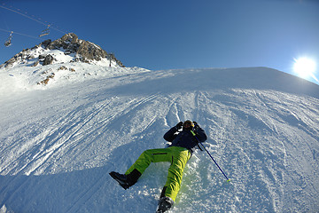 Image showing skiing on fresh snow at winter season at beautiful sunny day