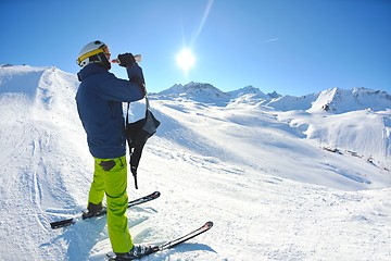 Image showing skiing on fresh snow at winter season at beautiful sunny day