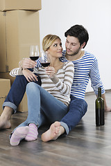 Image showing Young couple moving in new home