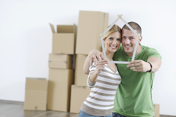 Image showing Young couple moving in new home