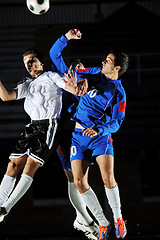 Image showing football players in action for the ball