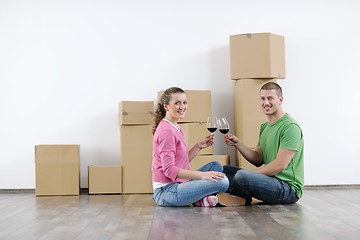 Image showing Young couple moving in new house