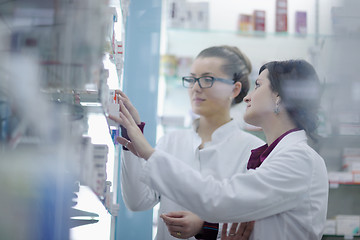 Image showing team of pharmacist chemist woman  in pharmacy drugstore