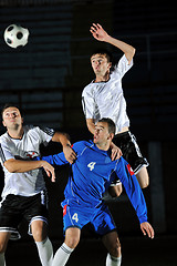 Image showing football players in action for the ball