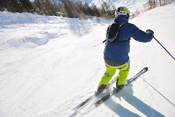 Image showing skiing on fresh snow at winter season at beautiful sunny day