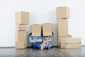 Image showing Young couple moving in new house