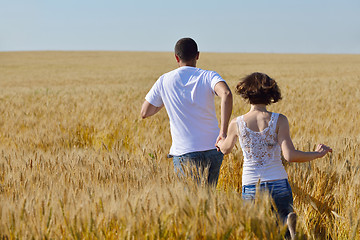 Image showing happy couple in wheat field