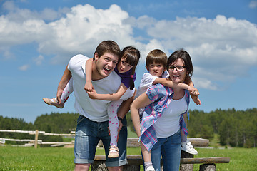 Image showing happy young family have fun outdoors