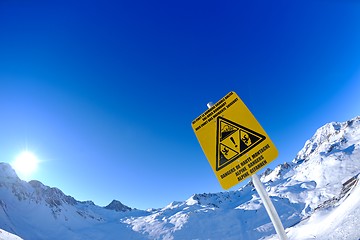 Image showing Sign board at High mountains under snow in the winter