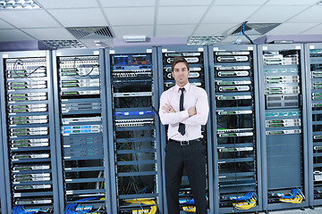 Image showing young it engineer in datacenter server room