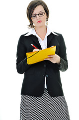 Image showing business woman hold papers and folder