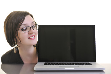 Image showing business woman working on laptop isolated on white