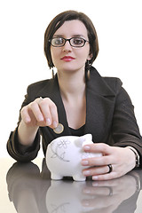 Image showing money saving with business womaon  isolatedwhite