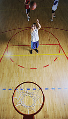 Image showing basketball player shooting