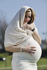 Image showing happy young pregnant woman outdoor