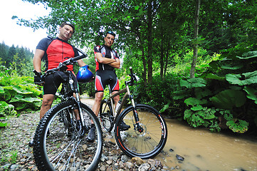 Image showing friendship and travel on mountain bike