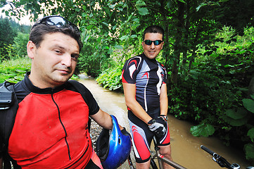 Image showing friendship and travel on mountain bike