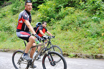 Image showing friendshiop outdoor on mountain bike