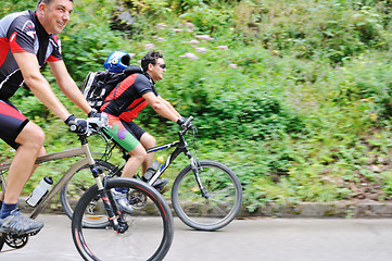 Image showing friendshiop outdoor on mountain bike