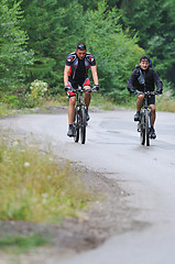 Image showing friendshiop outdoor on mountain bike