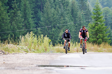 Image showing friendshiop outdoor on mountain bike