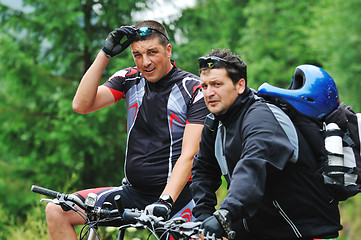 Image showing friendshiop outdoor on mountain bike