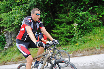 Image showing friendshiop outdoor on mountain bike