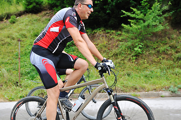 Image showing friendshiop outdoor on mountain bike