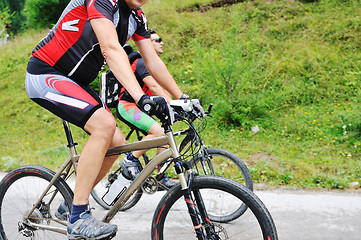 Image showing friendshiop outdoor on mountain bike