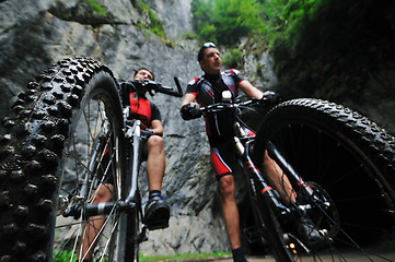 Image showing friendshiop outdoor on mountain bike