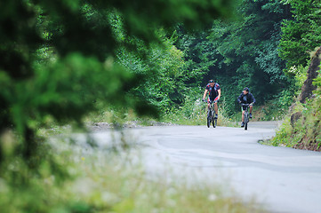 Image showing friendshiop outdoor on mountain bike