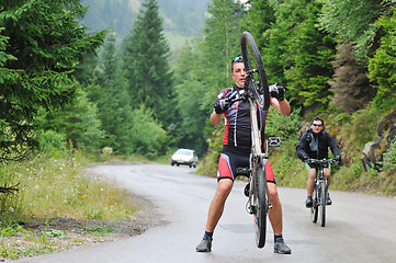 Image showing friendshiop outdoor on mountain bike