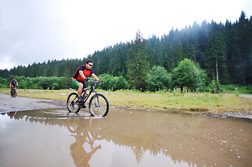 Image showing friendship and travel on mountain bike