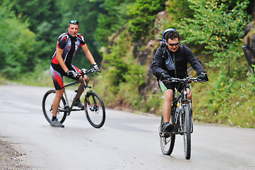 Image showing friendship and travel on mountain bike