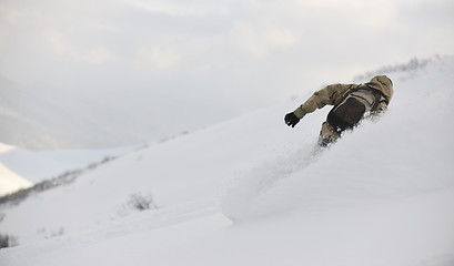 Image showing freestyle snowboarder