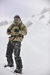 Image showing happy snowboarder portrait