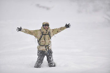 Image showing happy snowboarder portrait