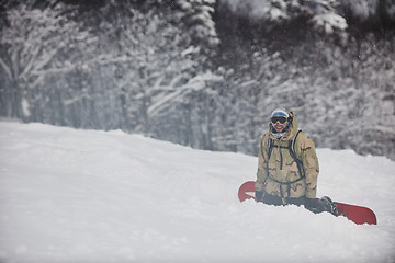 Image showing happy snowboarder portrait