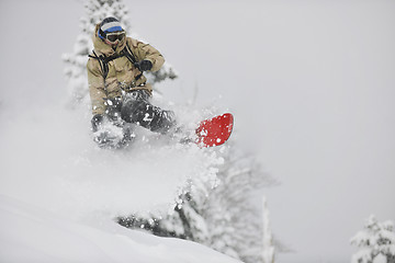 Image showing freestyle snowboarder