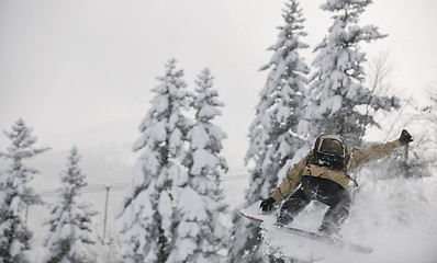 Image showing freestyle snowboarder