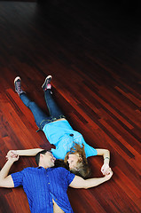 Image showing happy couple in empty apartment