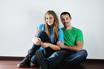 Image showing happy couple in empty apartment