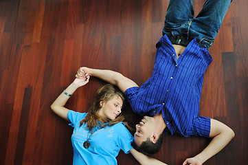 Image showing happy couple in empty apartment