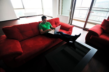 Image showing happy couple in empty apartment