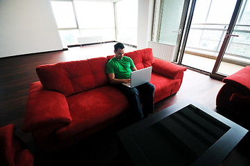 Image showing happy couple in empty apartment