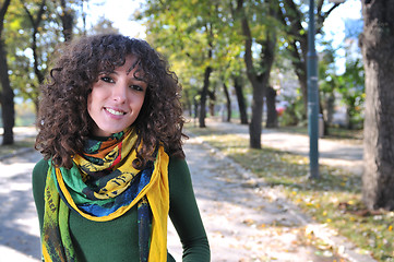 Image showing brunette Cute young woman  smiling 