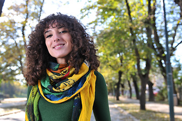 Image showing brunette Cute young woman  smiling 