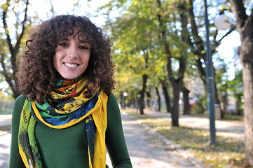 Image showing Young curly woman smiling 