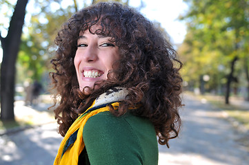 Image showing brunette Cute young woman  smiling 