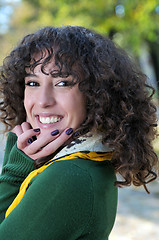 Image showing Young curly woman smiling 